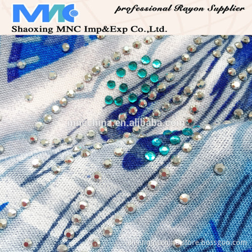 rayon print with stone fabric